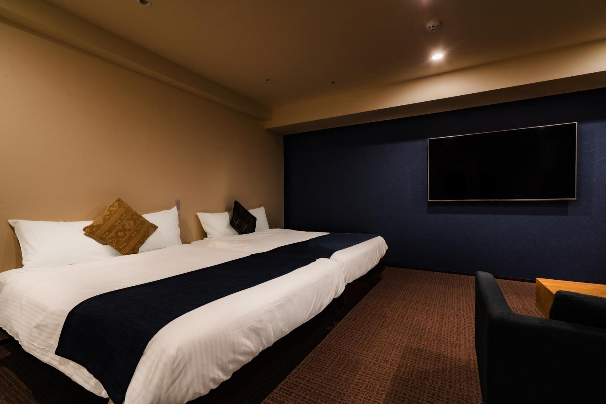 Randor Hotel Sapporo Suites Phòng bức ảnh A room at the hotel