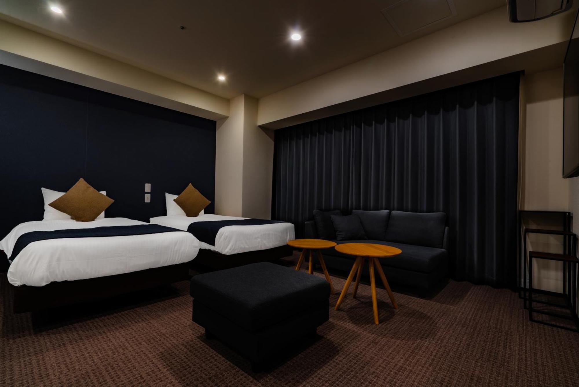 Randor Hotel Sapporo Suites Phòng bức ảnh A room at the hotel