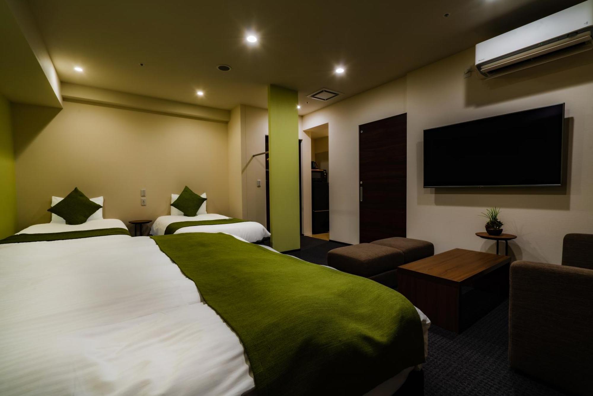 Randor Hotel Sapporo Suites Phòng bức ảnh A room at the hotel
