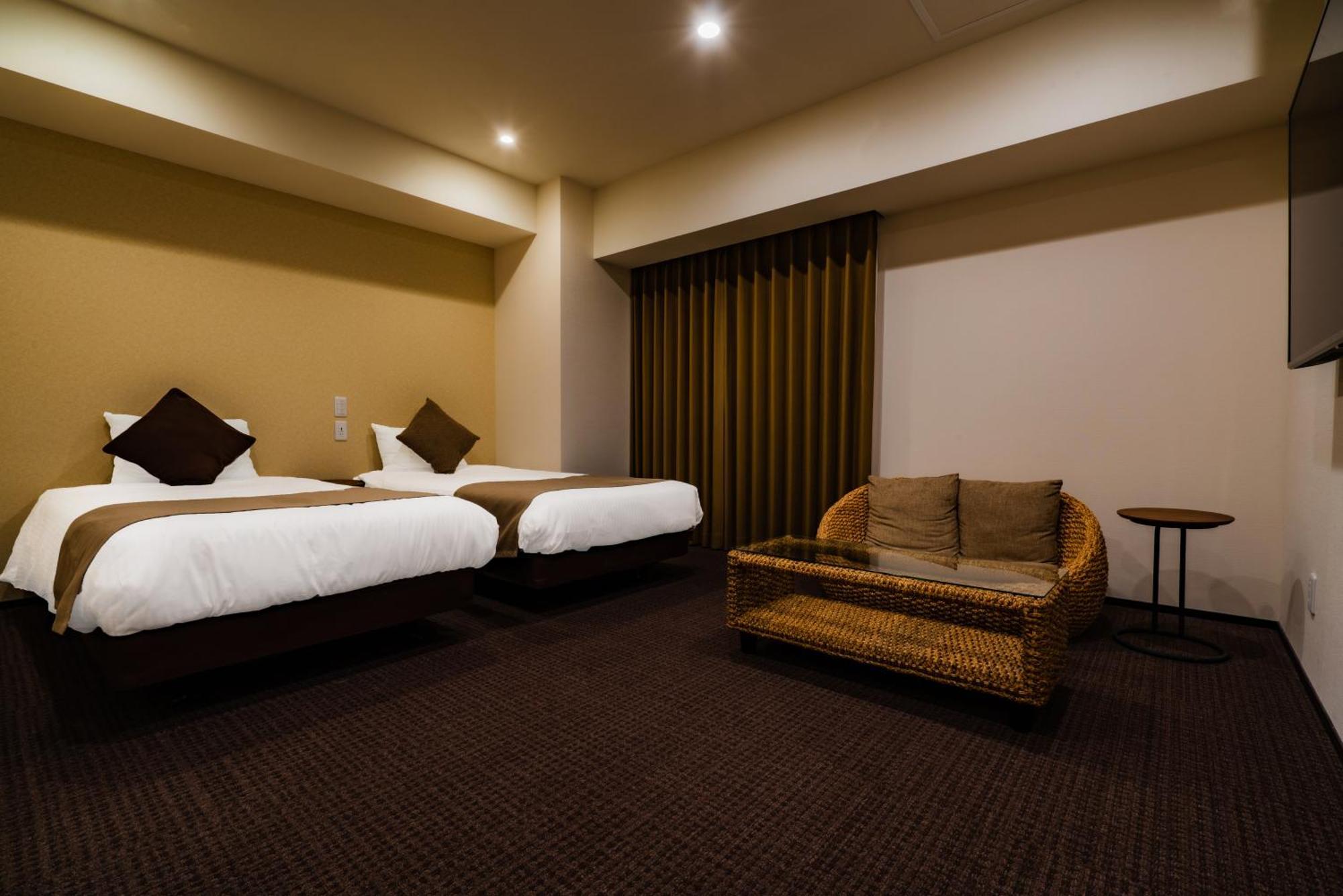 Randor Hotel Sapporo Suites Phòng bức ảnh A room at the hotel