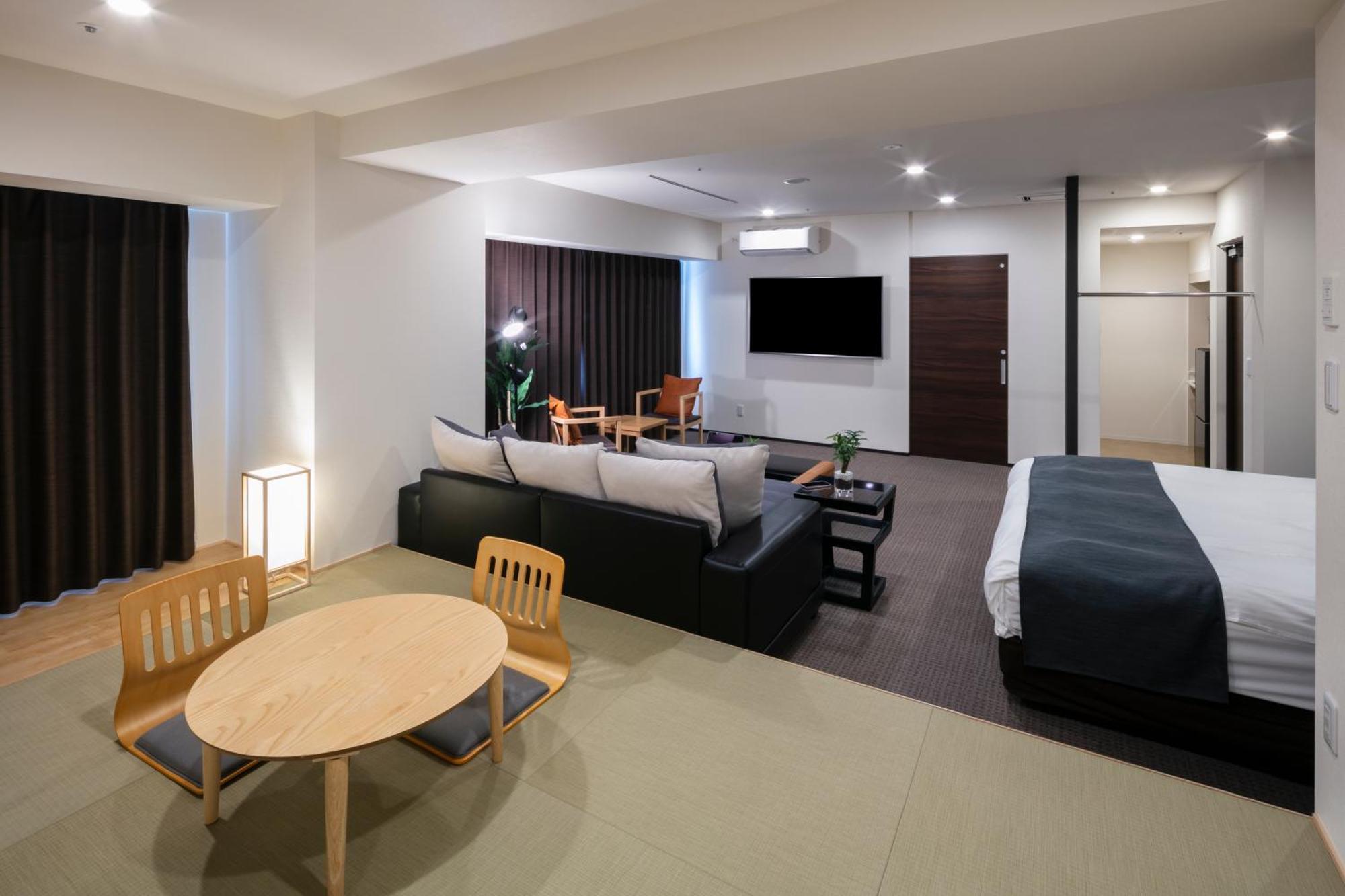 Randor Hotel Sapporo Suites Phòng bức ảnh A room at the hotel