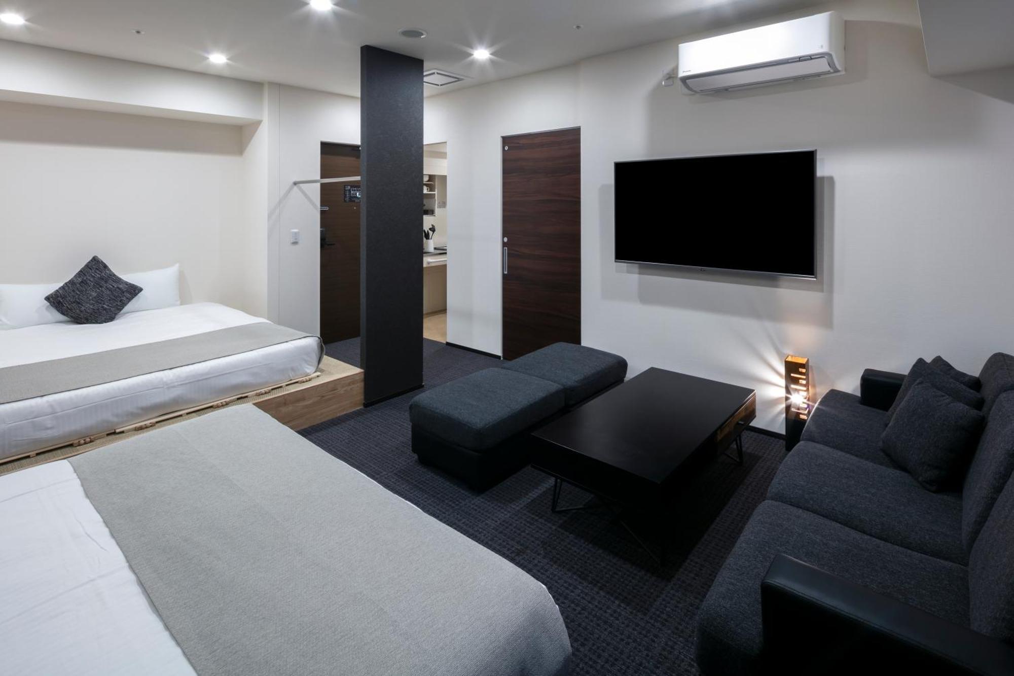 Randor Hotel Sapporo Suites Phòng bức ảnh A room at the hotel