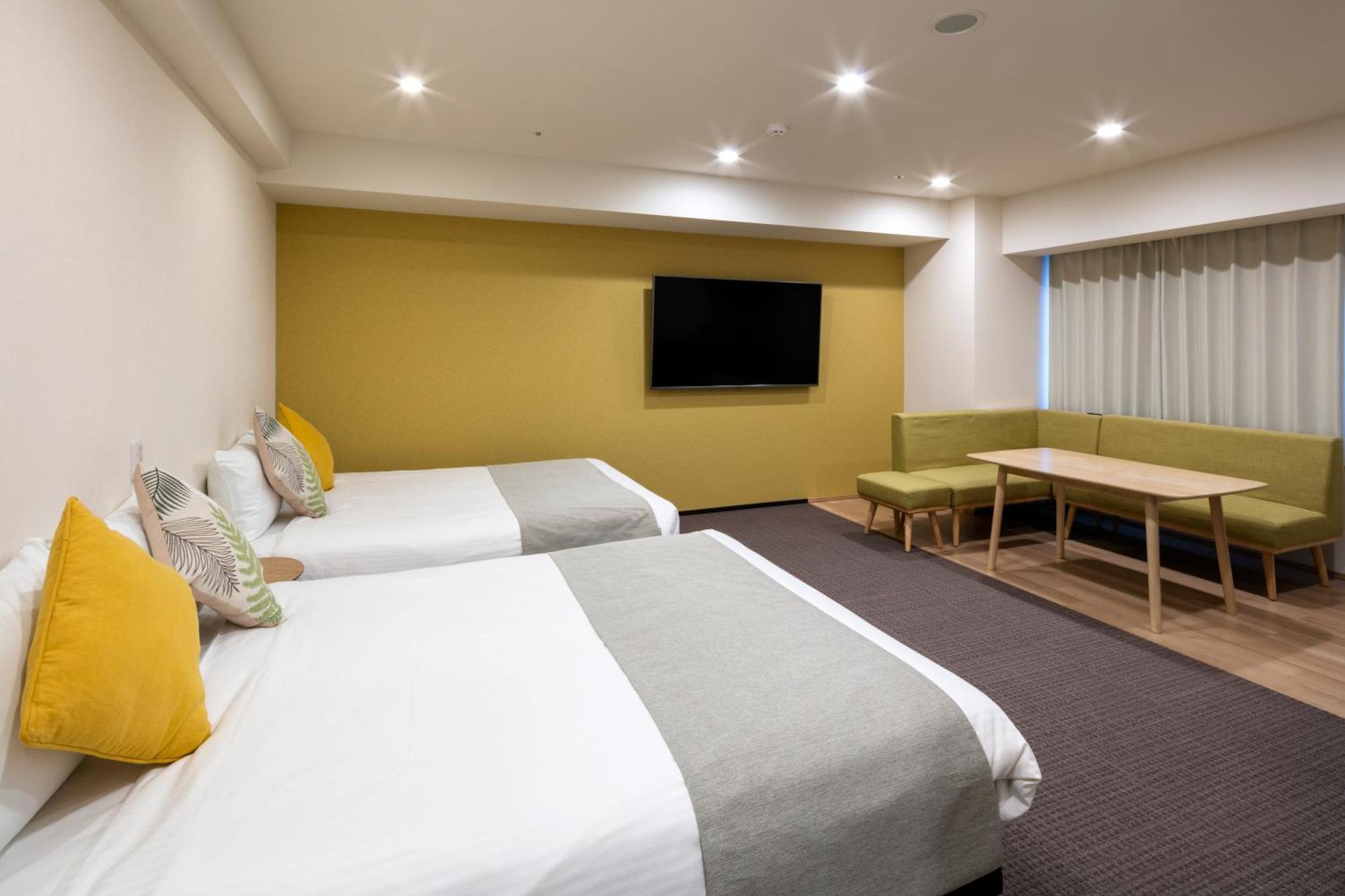 Randor Hotel Sapporo Suites Phòng bức ảnh A room at the hotel