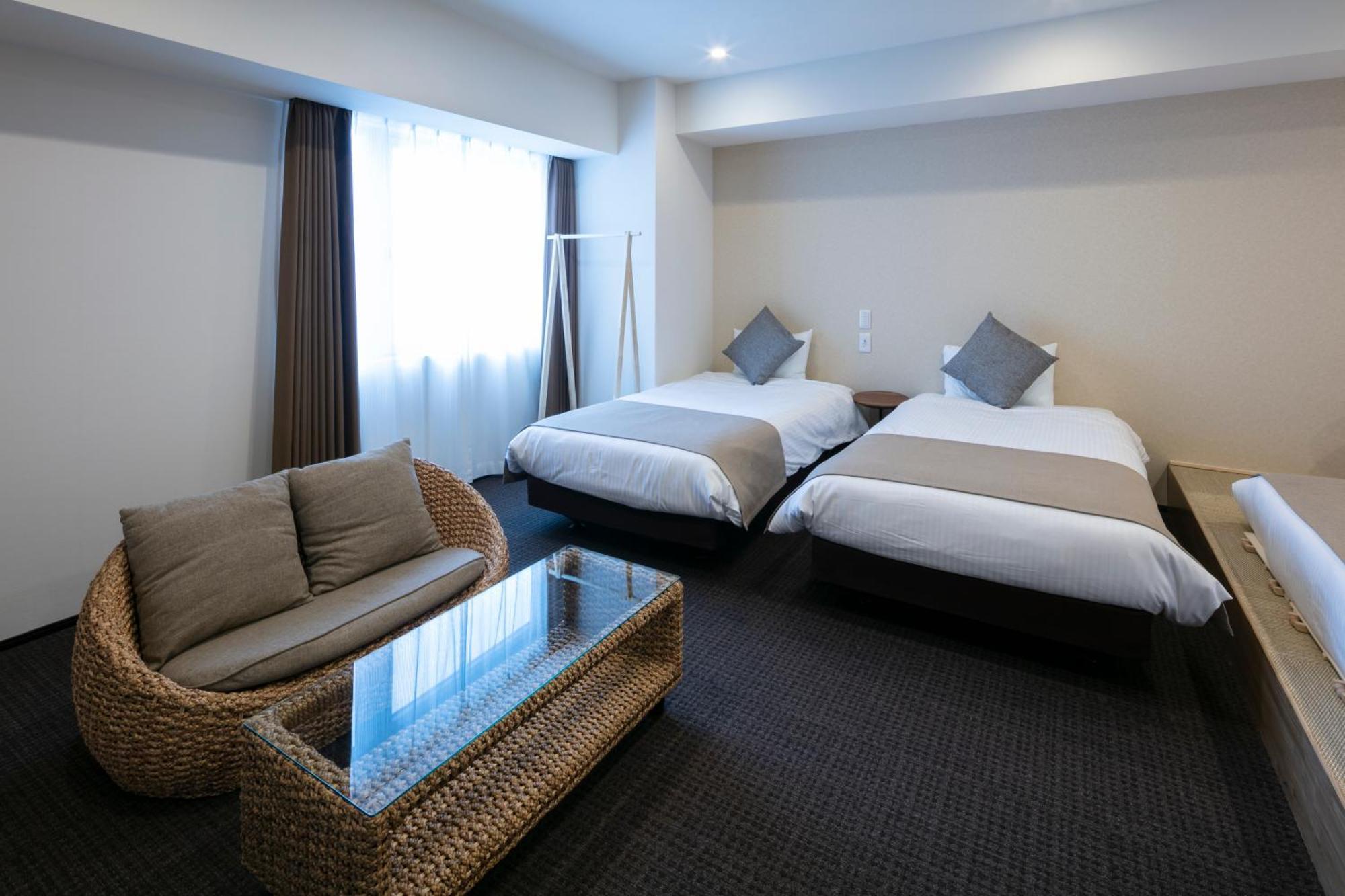 Randor Hotel Sapporo Suites Phòng bức ảnh A room at the hotel