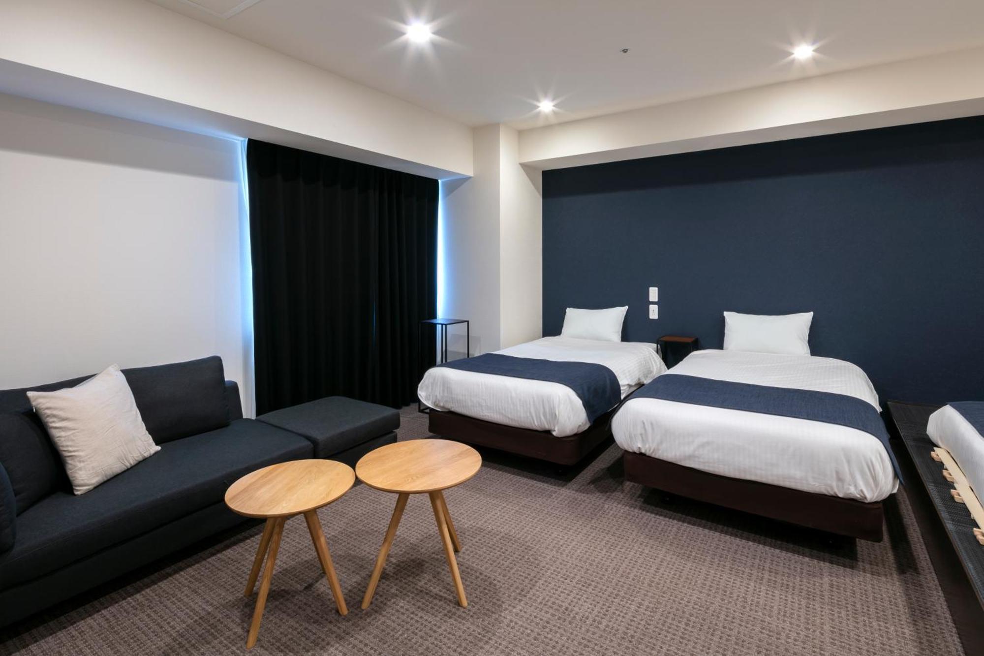 Randor Hotel Sapporo Suites Phòng bức ảnh A room at the hotel