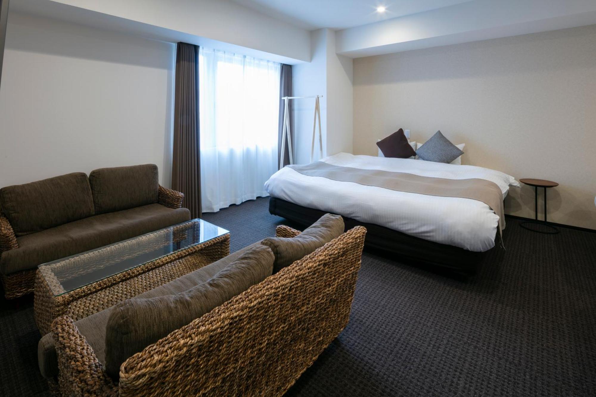 Randor Hotel Sapporo Suites Phòng bức ảnh A room at the hotel