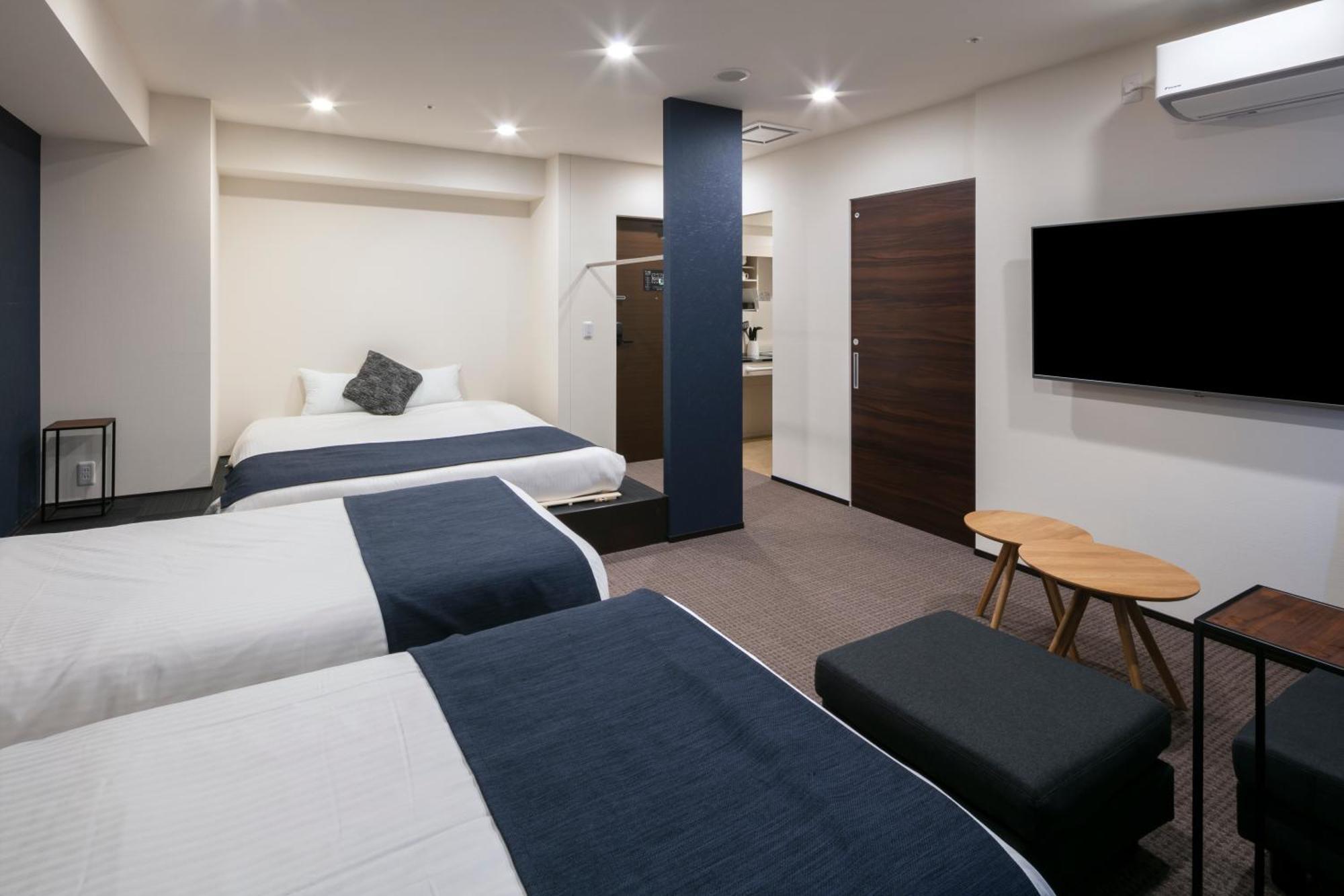 Randor Hotel Sapporo Suites Phòng bức ảnh A room at the hotel