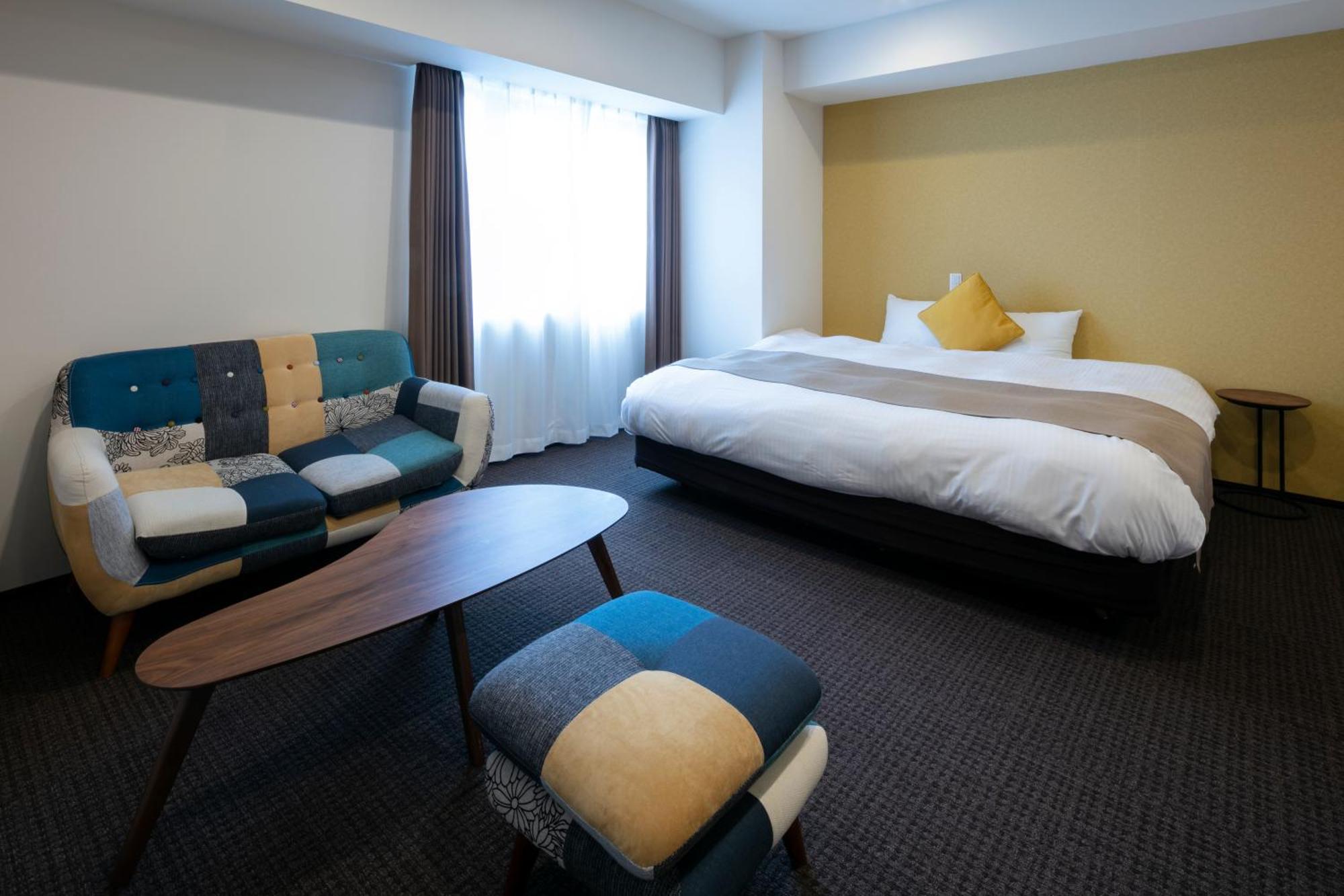 Randor Hotel Sapporo Suites Phòng bức ảnh A room at the hotel