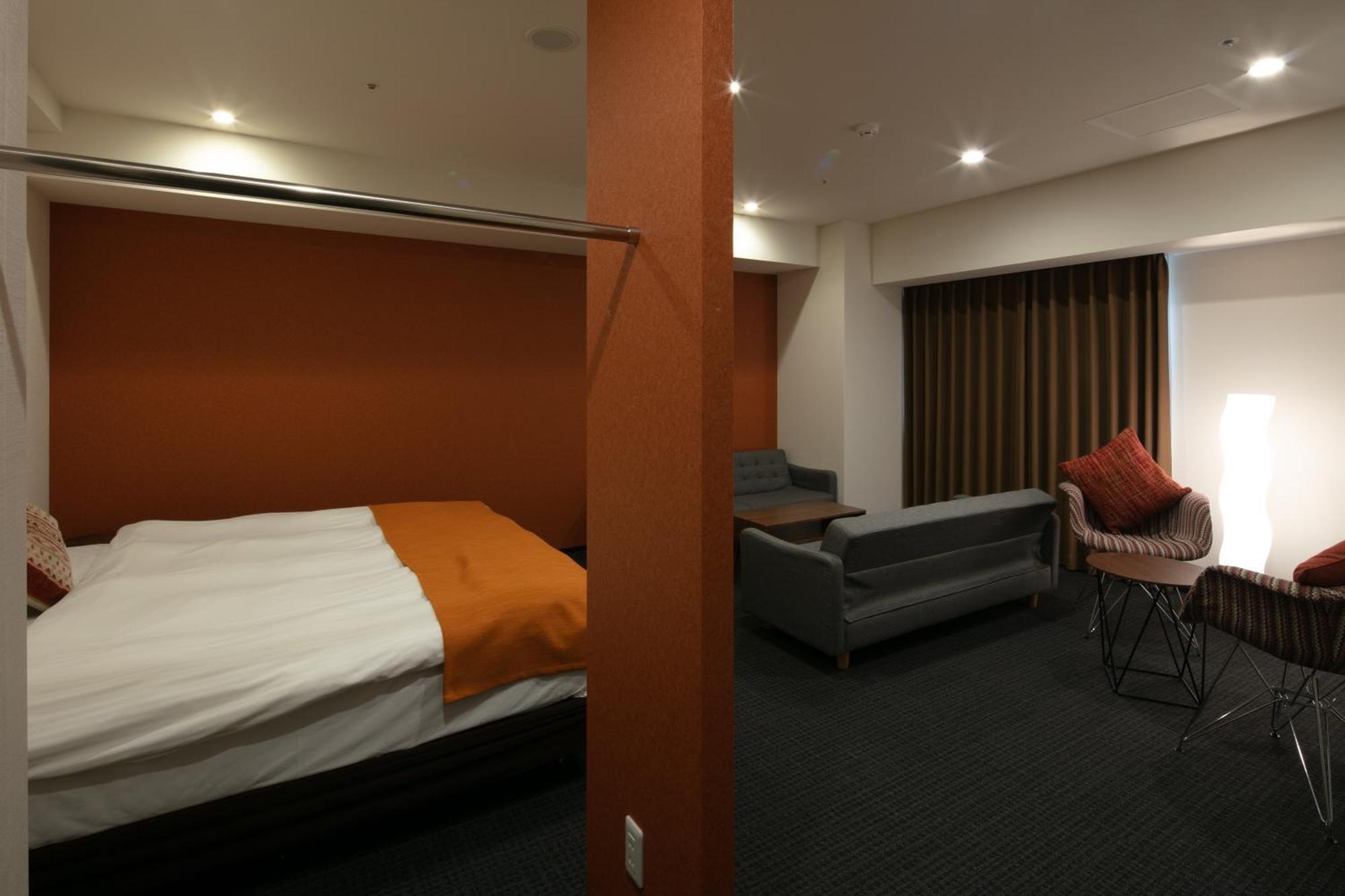 Randor Hotel Sapporo Suites Phòng bức ảnh A room at the hotel