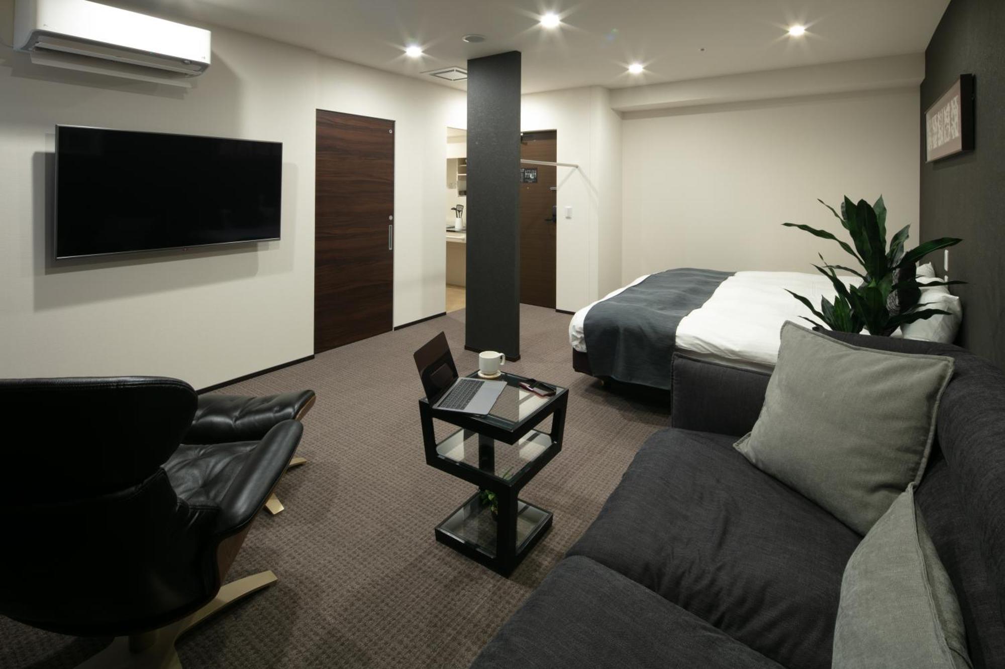Randor Hotel Sapporo Suites Phòng bức ảnh A room at the hotel