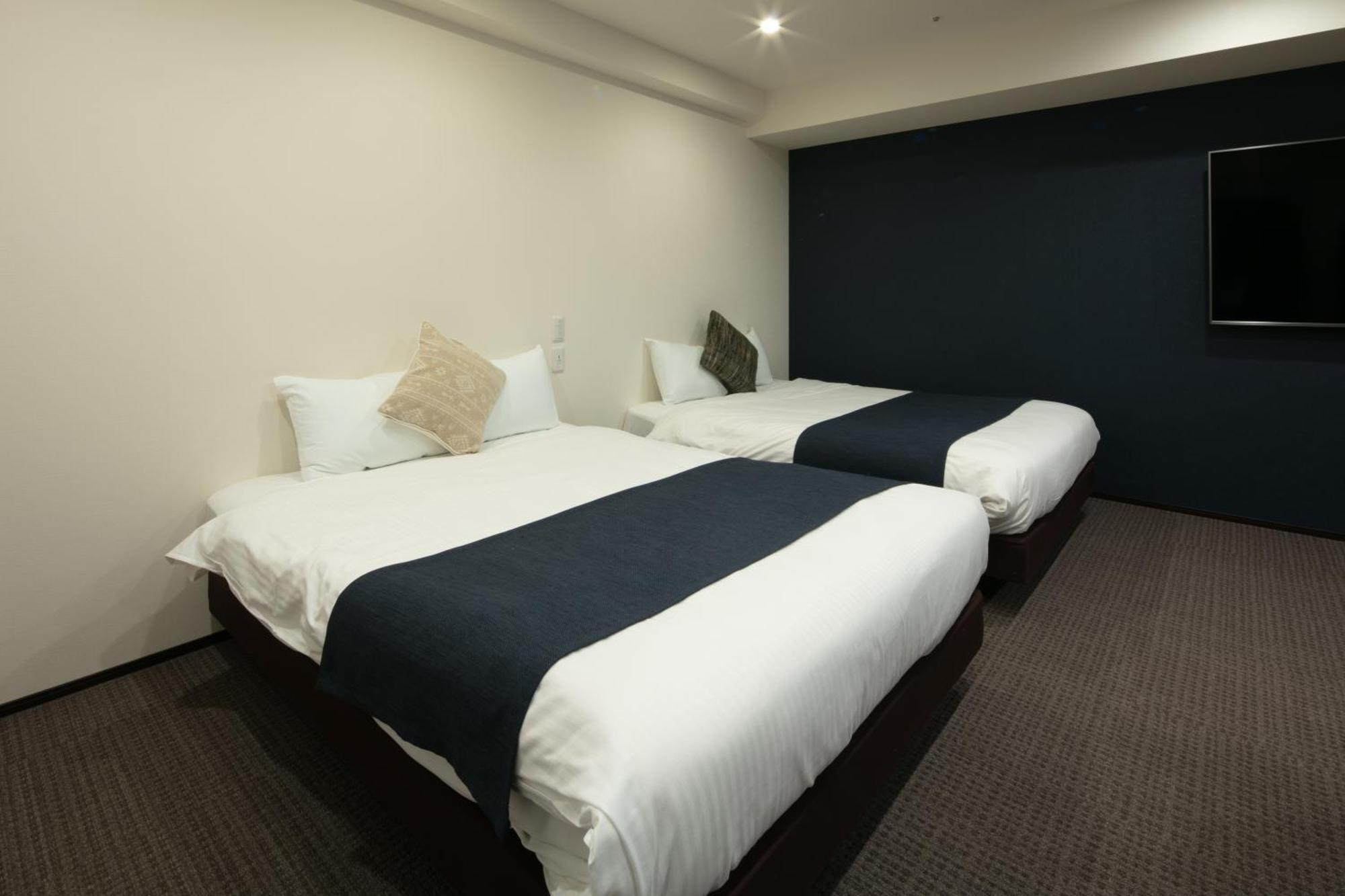 Randor Hotel Sapporo Suites Phòng bức ảnh A room at the hotel